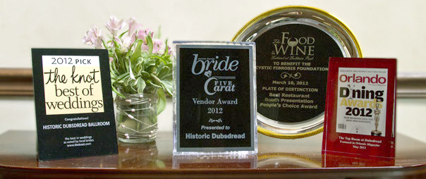 group of wedding venue awards on a table