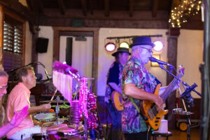 Band singing at the Vine and Dine event at the Taproom in Orlando Florida