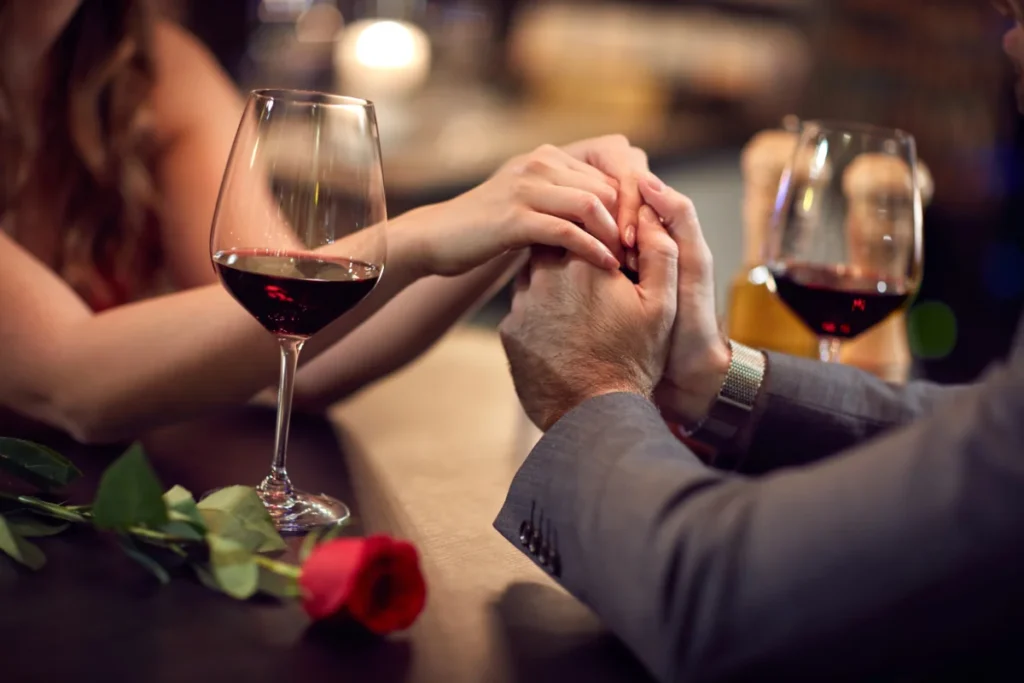 couple out on date night holding hands